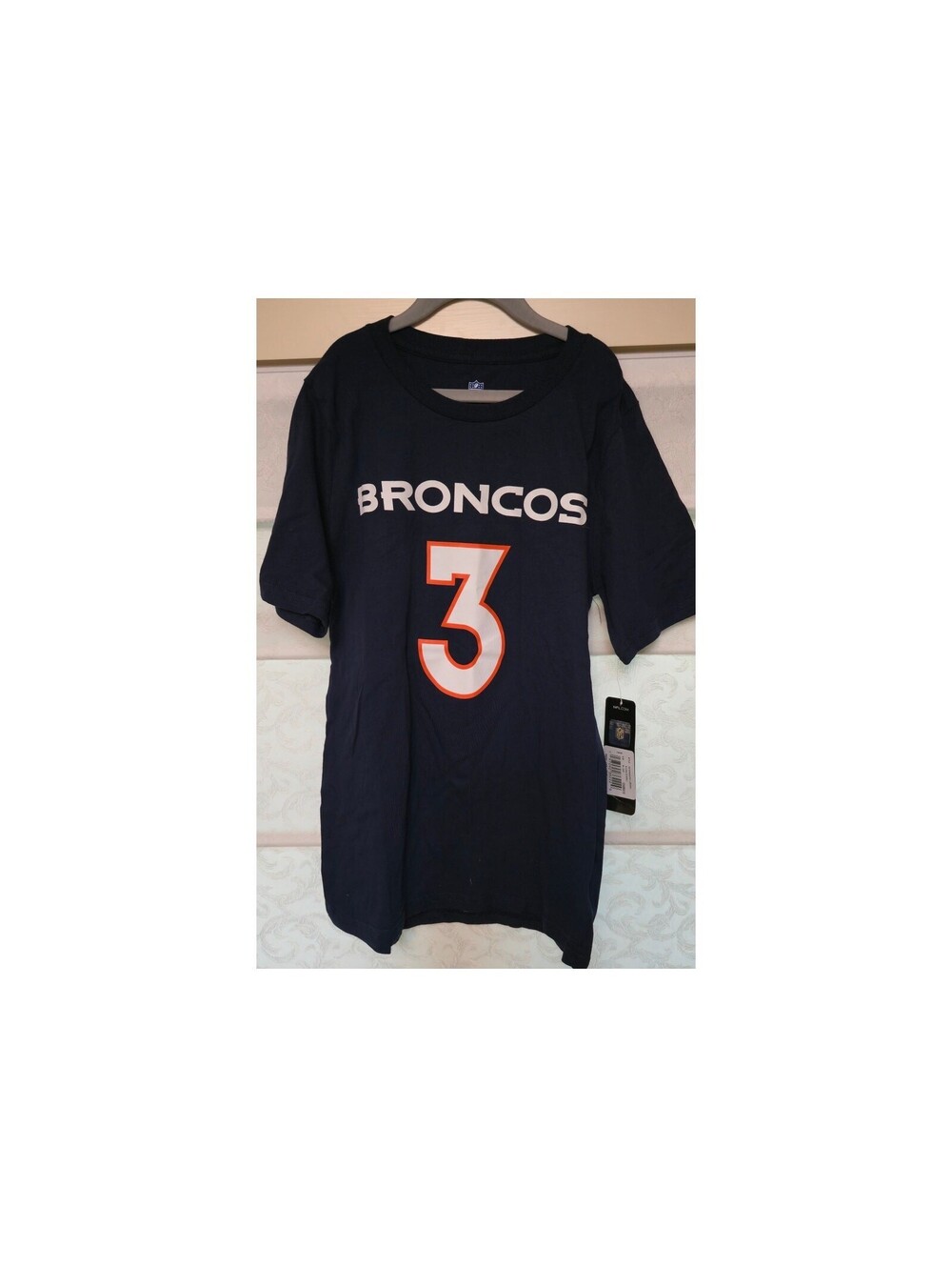Brand new with tags Denver Broncos Russell Wilson #3 Youth Medium NFL t-shirt.